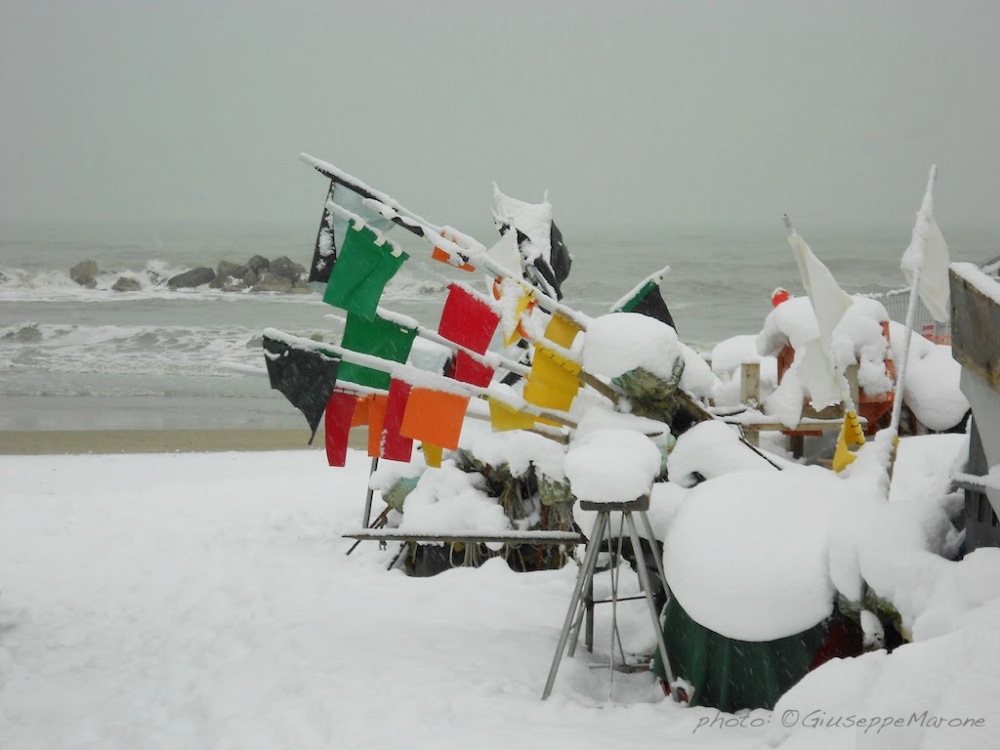 “The snow doesn't give a soft white damn whom it touches.” ~ E.E. Cummings :: Snow at the Seaside | photo: ©GiuseppeMarone