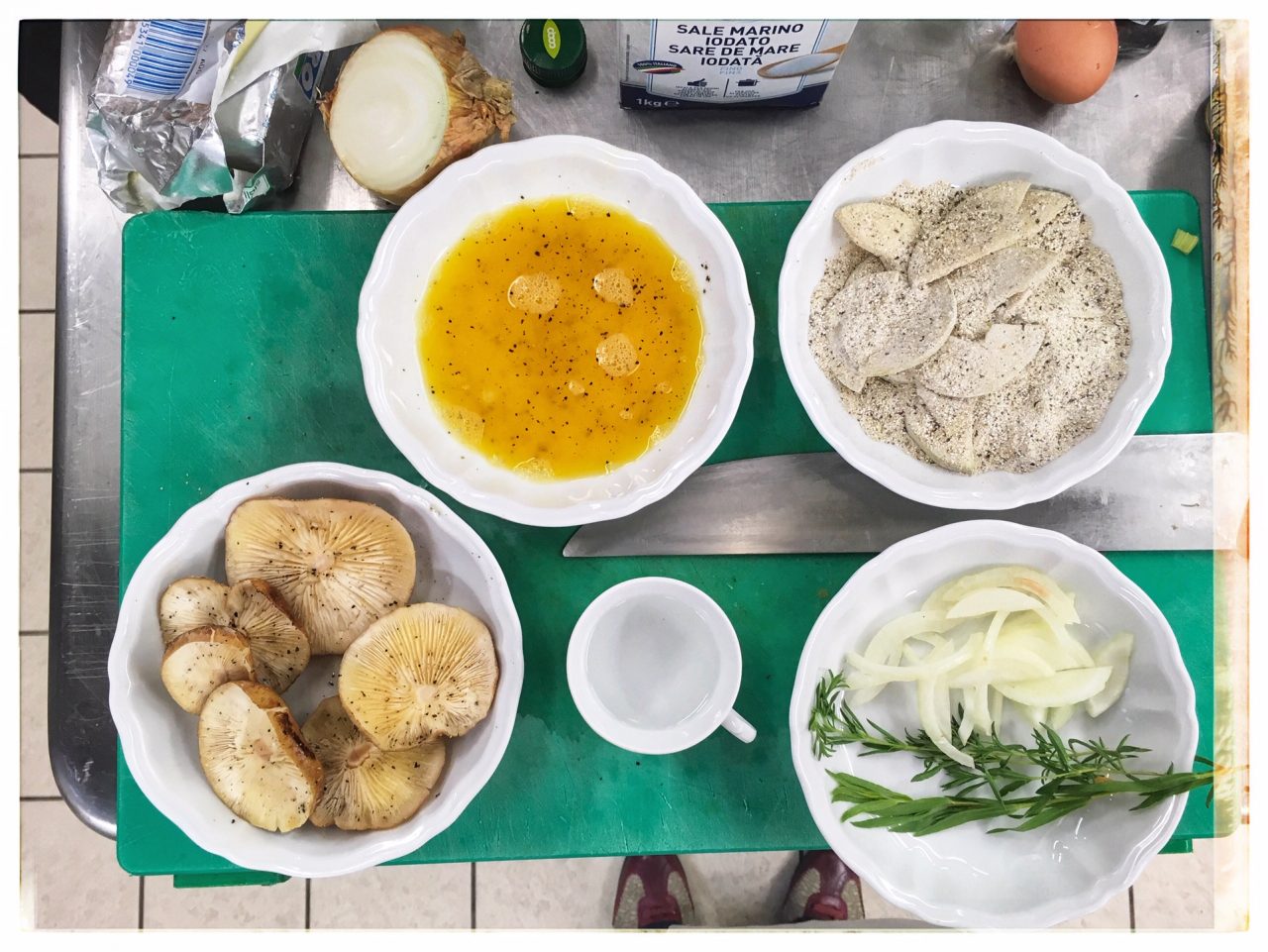 La Grappa del Trentino nel piatto: Palazzo Roccabruna kitchen. Prepping pears with buckwheat flour, grappa bianca and shitake mushrooms